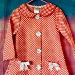 Pink and white micro polka dot over coat that would be perfect on your lovebugs.